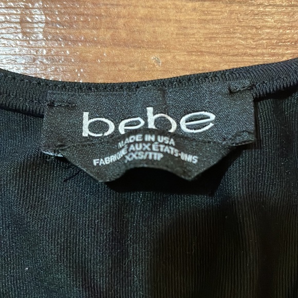 Women’s Bebe Black Scoop Neck Peplum Top Short Sleeve XXS - Picture 5 of 5